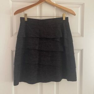 Prana charcoal grey mini-ish skirt. Size xs. Wool blend.
